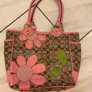 Coach logo bag with pink leather flowers